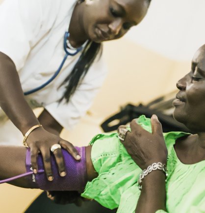 Photo: A health worker participates in a training on noncommunicable diseases. More than 400 health workers in Ghana received such training through PATH-supported projects and programs.