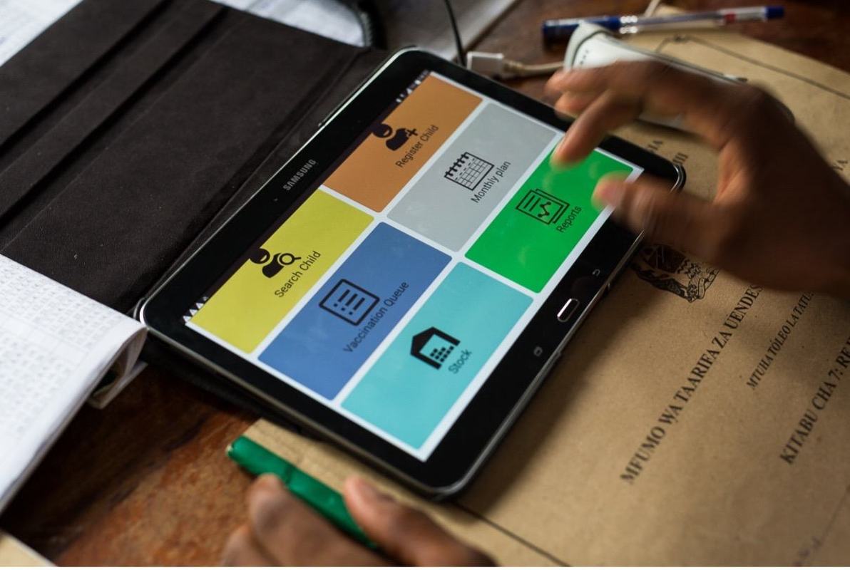 An immunization worker enters vaccination data into an electronic immunization registry. Photo: PATH.
