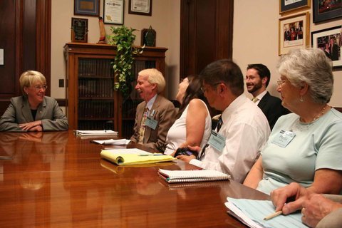 Bob Dickerson (second from left) laughs with Washington Senator Patty Murray .