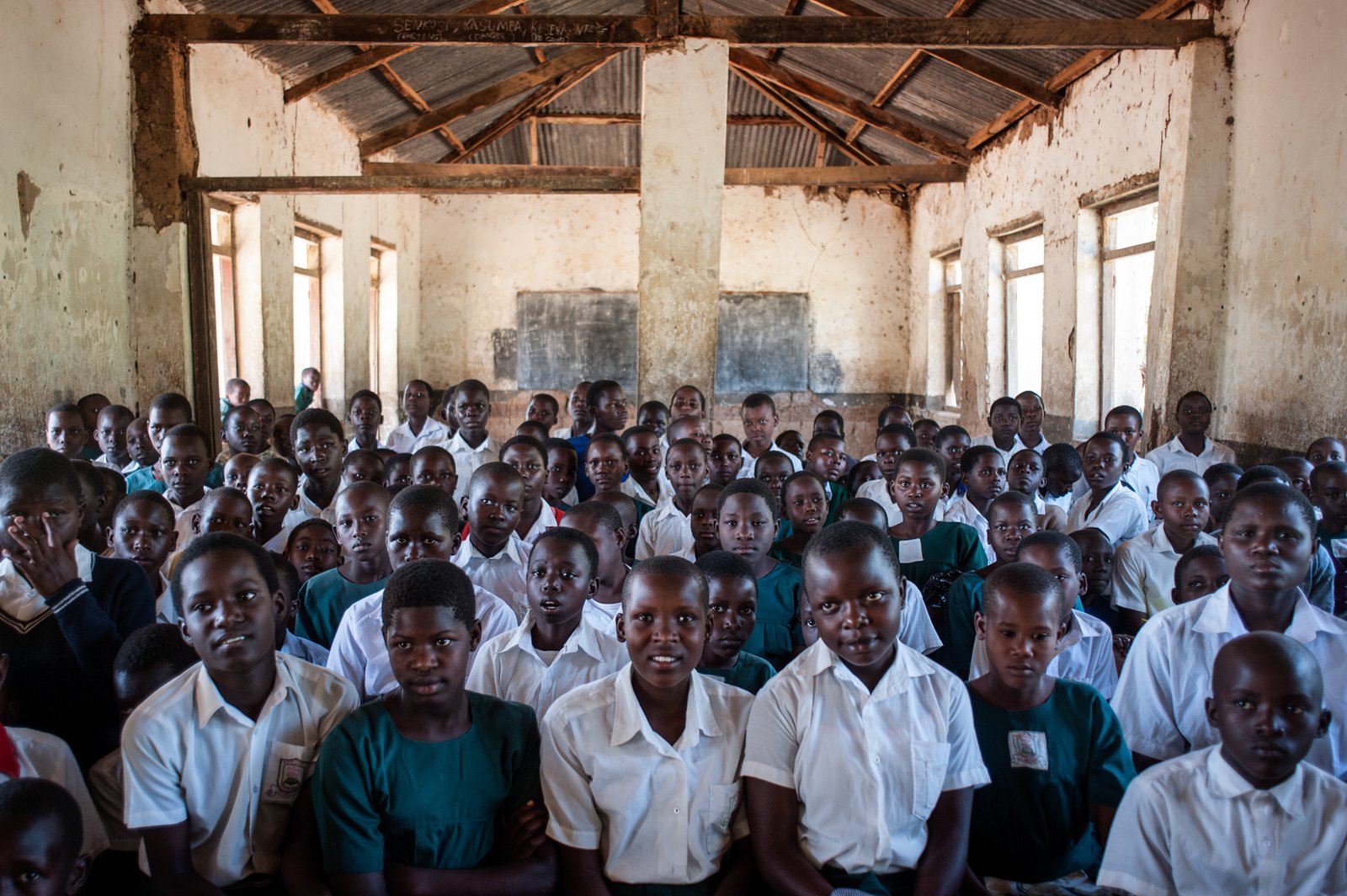 A classroom full of preteen girls gather to talk about the importance of the HPV vaccine to prevent cervical cancer. Photo: PATH/Will Boase