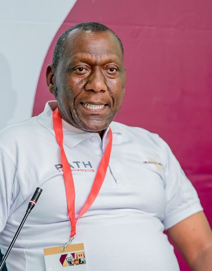 Nambaje Elias, a CKD survivor, shares his story during a panel discussion at the launch of the expanded Healthy Heart Africa project in Rwanda. Photo: PATH/Kanyarwanda Arts.