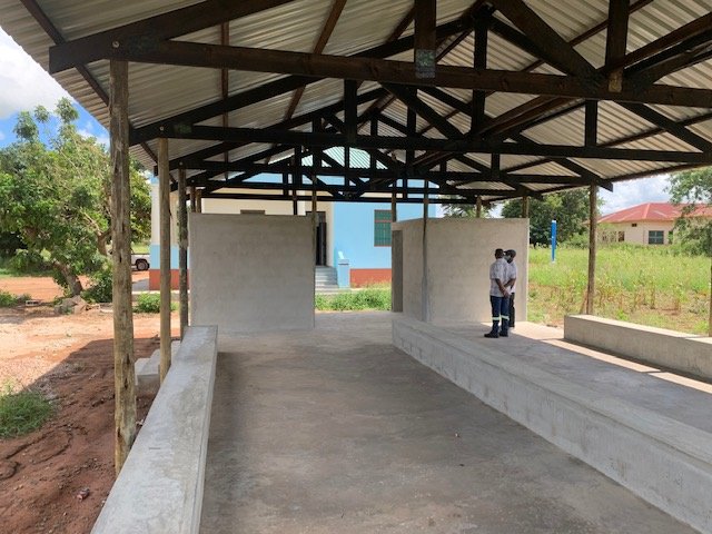 A covered waiting area for trial participants, currently under construction in Mozambique. Photo: PATH