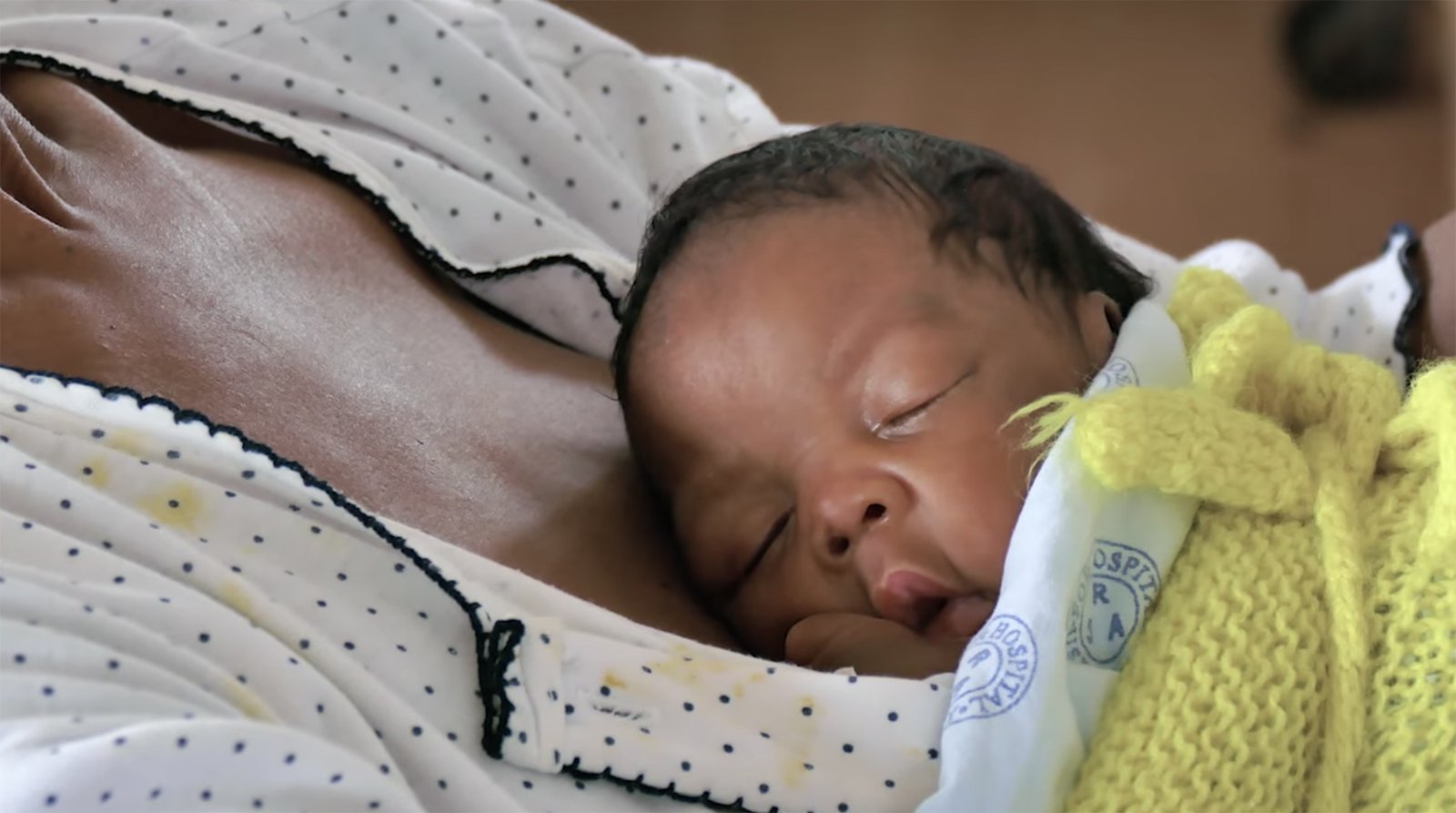 A new mother in Durban, South Africa practices "kangaroo mother care," skin-to-skin contact between the baby's front and the mother's chest. Photo: PATH.