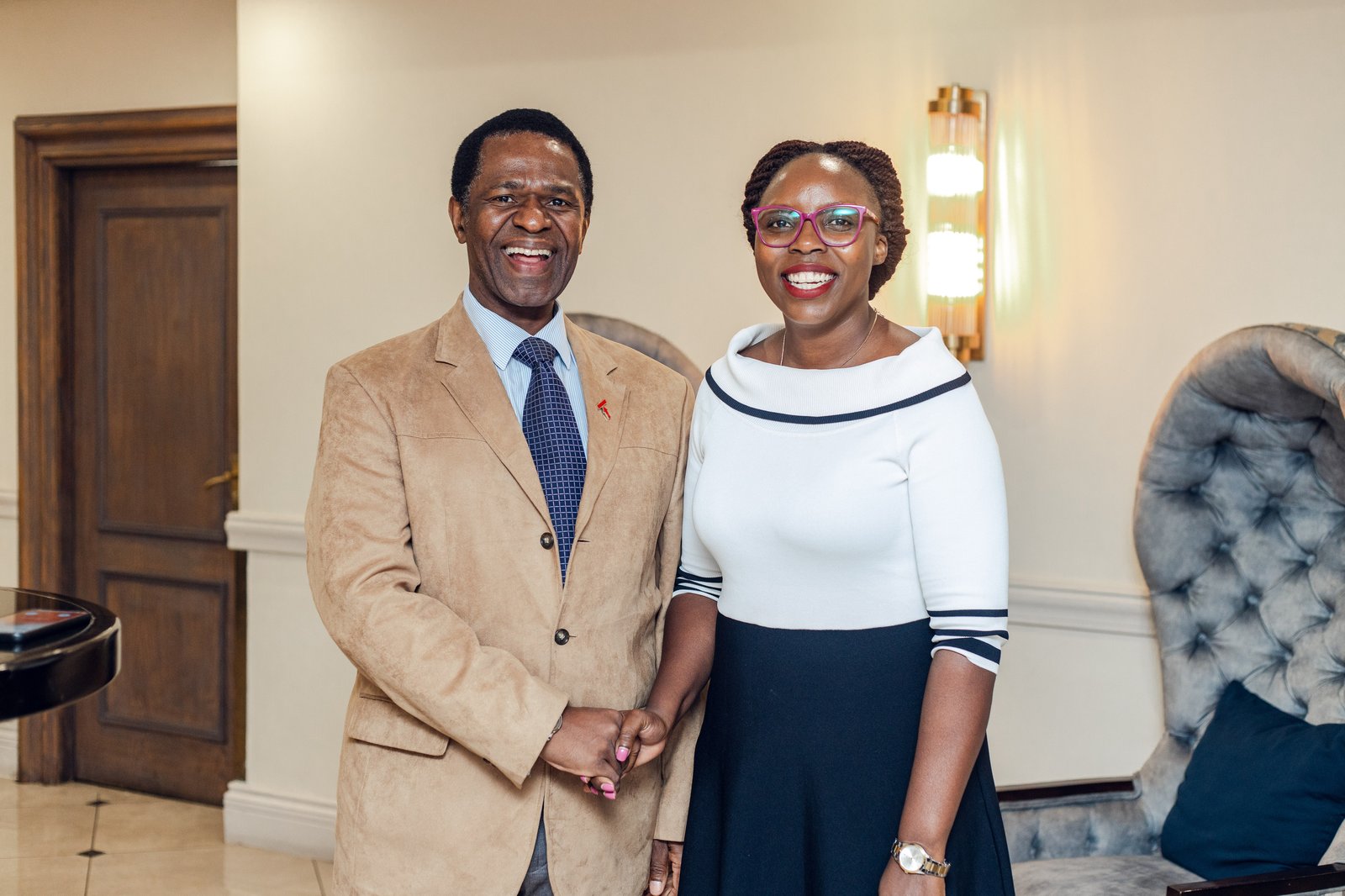 PATH’s Global MNCH and Immunization Advocacy Lead Esther Nasikye and South Africa National Assembly Hon. Dhlomo exchange a warm greeting. Photo: PATH/Bright Mokome.