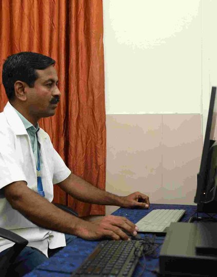 A doctor at the district primary health care centre at Karad, in Maharashtra's Satara district.  Shubham Gandhi/PATH