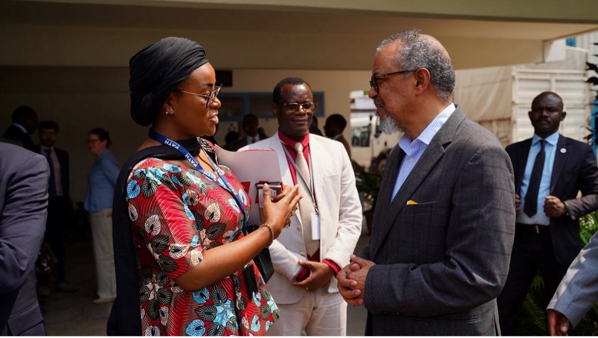 Nelly Moleka, PATH DRC Country Representative, in conversation with WHO Director-General Dr. Tedros Adhanom Ghebreyesus following the Ebola outbreak strategic roundtable in Kinshasa, May 29, 2026. Photo: PATH.