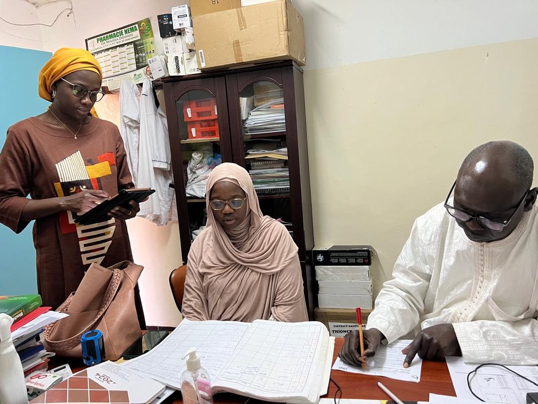 Public health experts at a laboratory in Senegal’s Ziguinchor region review registers of suspected and confirmed meningitis cases.