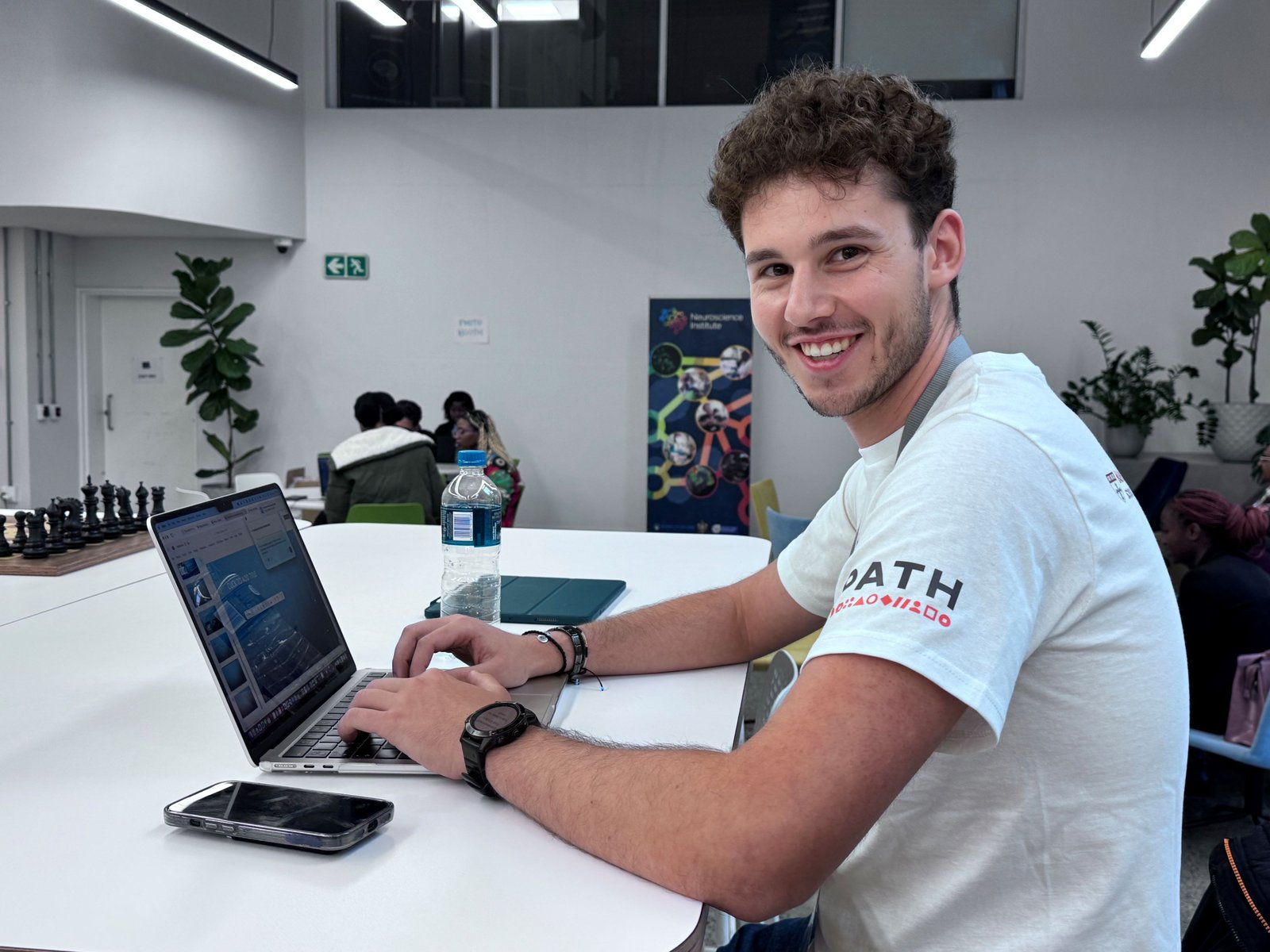 A hackathon participant types on a laptop during the event at the University of Cape Town, South Africa. Photo: PATH/Sintha Chiumia.