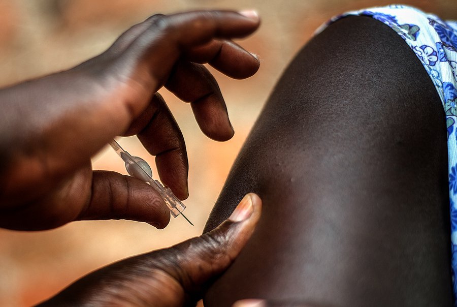 A closeup of Sayana Press being injected into an arm.