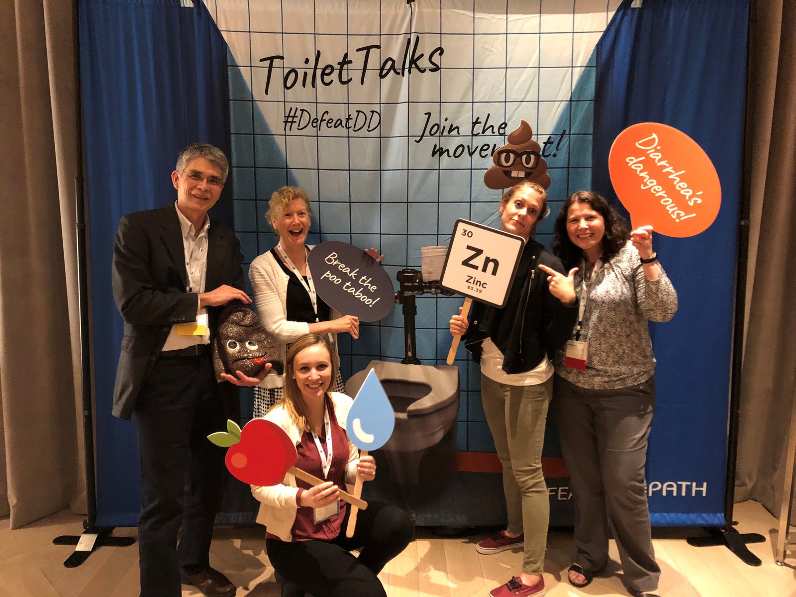 PATH staff members participate in a DefeatDD photo booth at the 2018 VASE Conference in Mexico City. Photo: PATH.