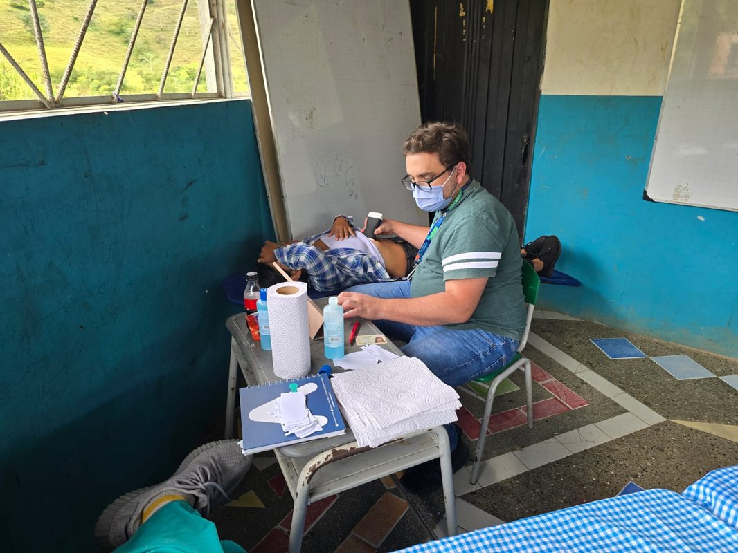 Radiology student Esteban Marín performs a liver ultrasound on a patient in the indigenous community in Antioquia, Colombia, for telemedicine follow-up and care from the Digital Hospital's Telesalud LivingLab at the University of Antioquia.