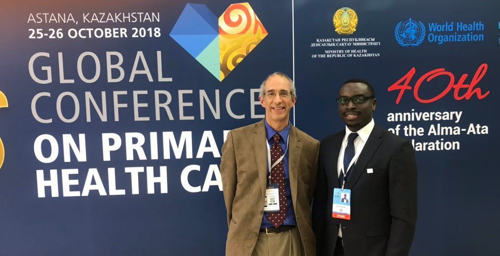 Brian Atuhaire with David Bishai, health economist at Johns Hopkins University, during the Global Conference on Primary Health Care in Astana, Kazakhstan in October 2018. Photo: PATH/Brian Atuhaire.